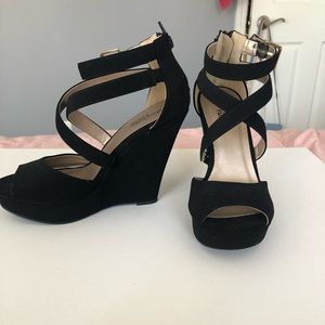 Black strappy wedge heels with zip back